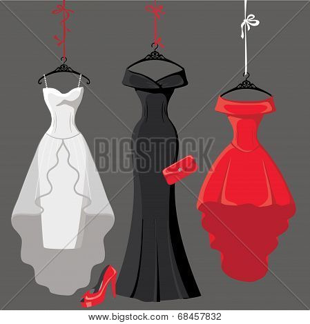 Set Of  Three Party Dresses Hang On Ribbons