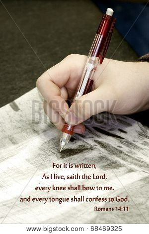 Teen hand holding pencil over Bible verse