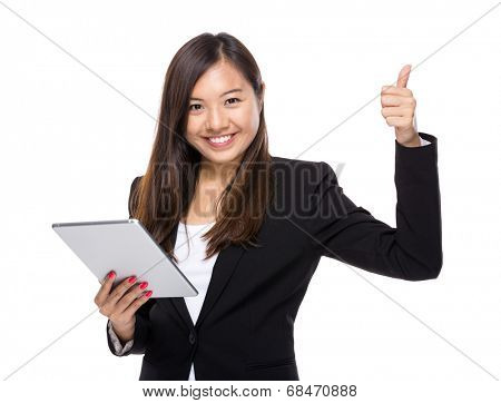 Asian business woman with tablet and thumb up