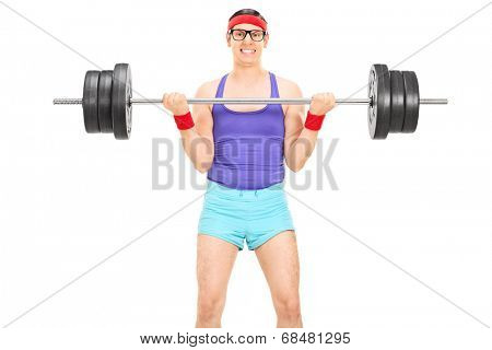 Nerdy guy lifting a heavy weight isolated on white background