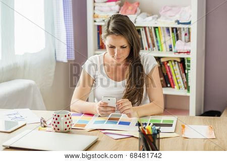 Pregnant woman working from home