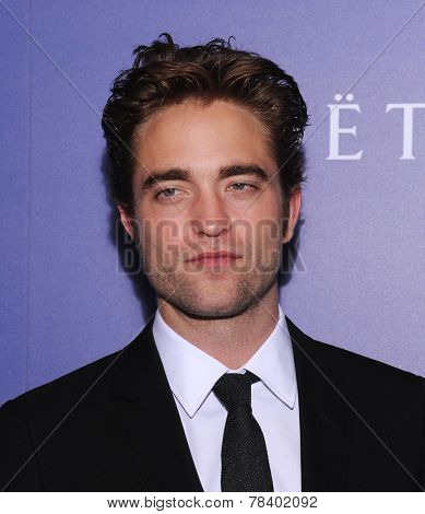 LOS ANGELES - AUG 14:  Robert Pattinson arrives to the HFPA Annual Installation Dinner 2014 on August 14, 2014 in Beverly Hills, CA                