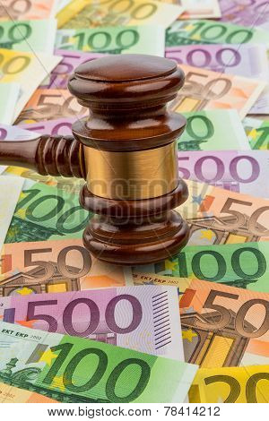 gavel and euro banknotes. symbolic photo for costs in court, rule of law and auctions
