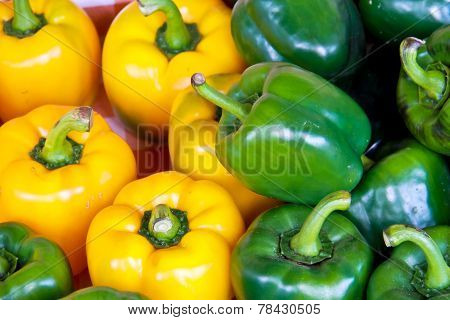 Green And Yellow Bell Pepper Or Sweet Pepper Or Capsicum  Natural Background