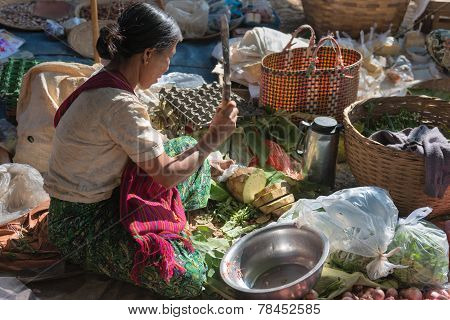 Burmese Woman Cut Vegetables On Asian Open Market