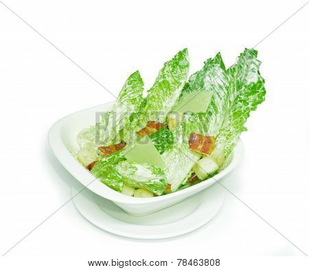 Caesar salad on white cup