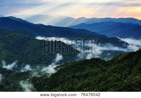 Sunset and ray over mountain hills