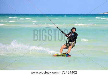 Man riding his kiteboard. Cayo Guillermo in Atlantic Ocean.