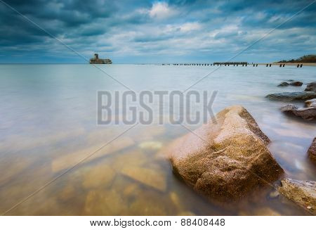 Baltic Rocky Coast With Old Military Buildings From World War Ii And Wooden Breakwaters.