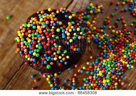 Chocolate Cup Cake And Candy Colored Glaze
