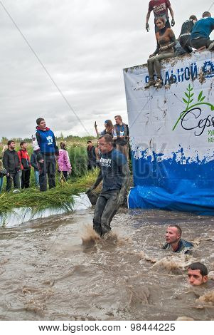 Sportsmen jumps in water. Steel Character. Tyumen