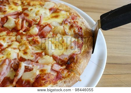 Delicious Hawaiian Rustic Style Pizza Made With Fresh Pineapples,ham And Mozzarella Cheese