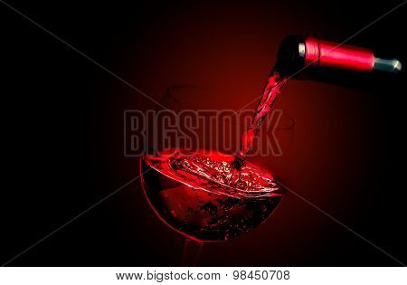 Barman Pouring Red Wine In The Glass