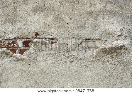 Old cement plaster and old red brick