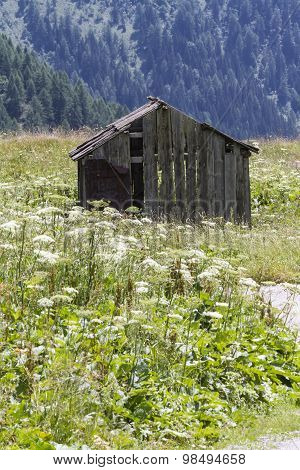 an old wooden cottage in the mountain