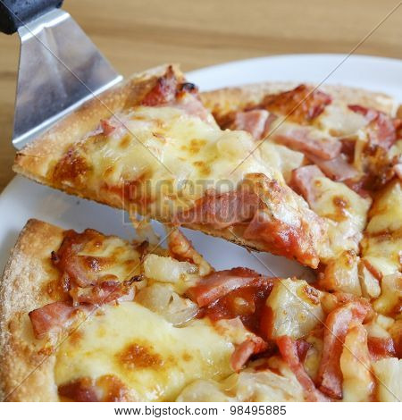 Delicious Hawaiian Rustic Style Pizza Made With Fresh Pineapples,ham And Mozzarella Cheese