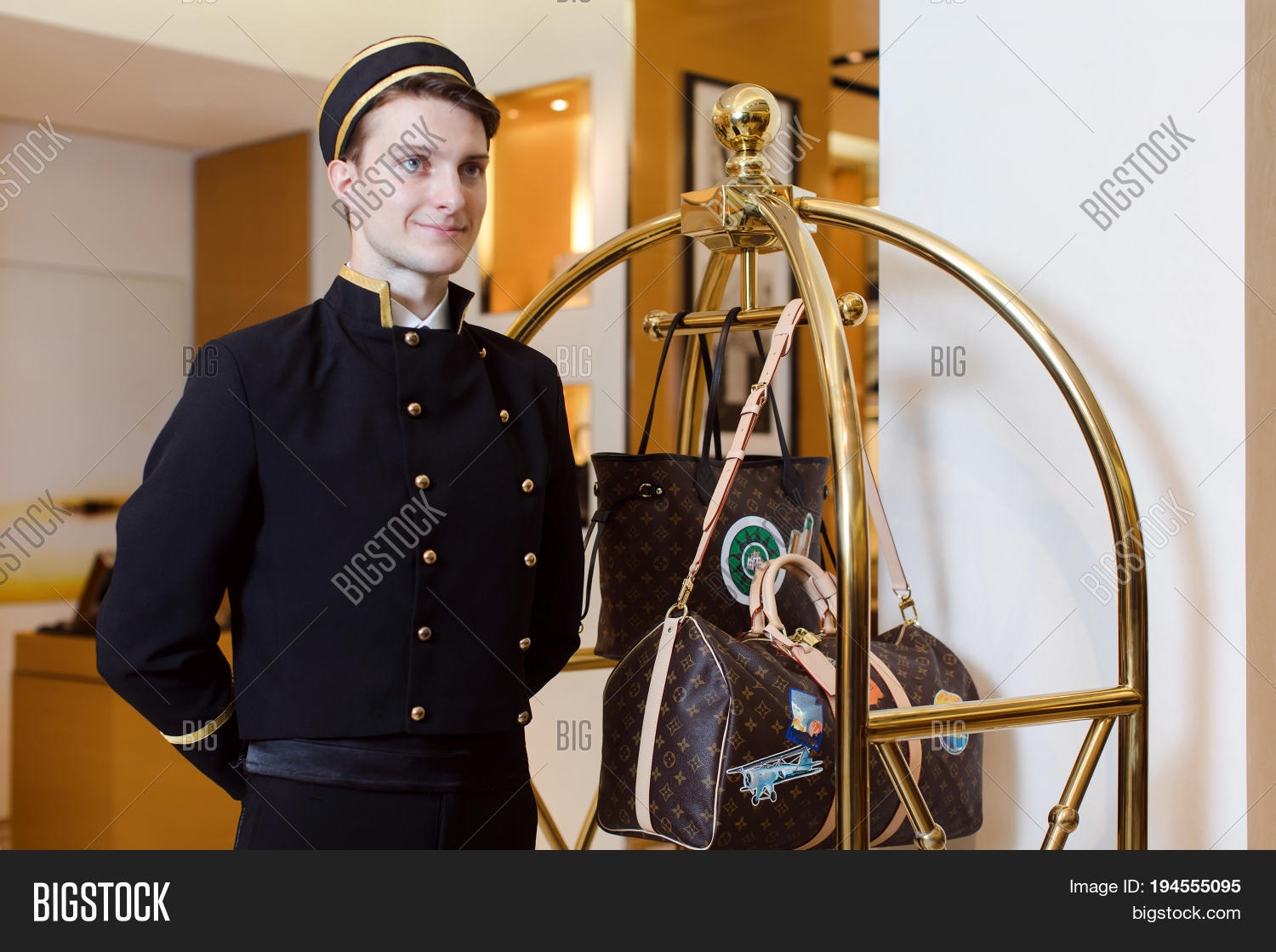 Smiling Man Bellboy Image & Photo (Free Trial) Bigstock