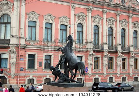 View of Horse tamers monument by Peter Klodt on Anichkov Bridge in Saint-Petersburg Russia. Popular touristic landmark..ST. PETERSBURG, RUSSIA , July 4, 2017