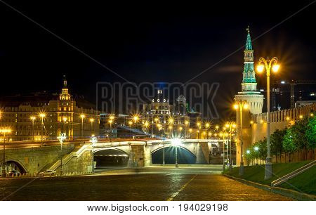 RUSSIA MOSCOW MAY 27 2017: The twightlight from the Red square behind the Saint Basil Church night view beautiful and the bridge into the Red square and Kremlin Palace.