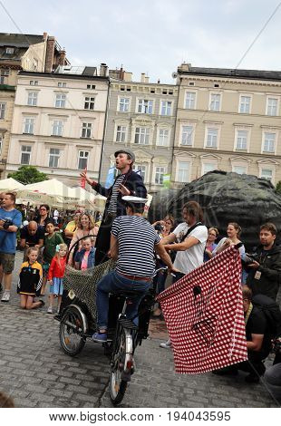 CRACOW POLAND - JULY 5 2017: 30th Street - International Festival of Street Theaters in Cracow Poland. An Odyssey Towards New Shores - a street parade