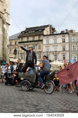 CRACOW POLAND - JULY 5 2017: 30th Street - International Festival of Street Theaters in Cracow Poland. An Odyssey Towards New Shores - a street parade