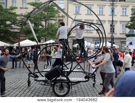 CRACOW POLAND - JULY 5 2017: 30th Street - International Festival of Street Theaters in Cracow Poland. An Odyssey Towards New Shores - a street parade