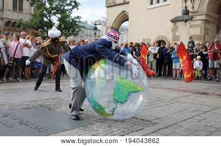 CRACOW POLAND - JULY 5 2017: 30th Street - International Festival of Street Theaters in Cracow Poland. An Odyssey Towards New Shores - a street parade