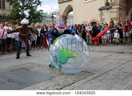 CRACOW POLAND - JULY 5 2017: 30th Street - International Festival of Street Theaters in Cracow Poland. An Odyssey Towards New Shores - a street parade
