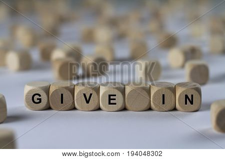 Give In - Cube With Letters, Sign With Wooden Cubes