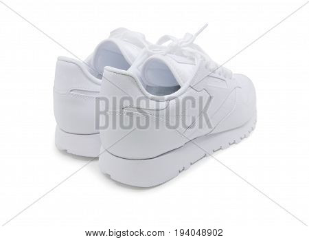 White leather shoes,sneakers back view on white background