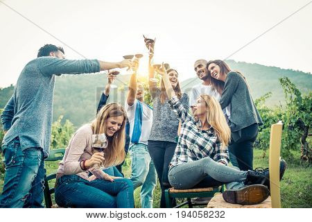 Group of friends at restaurant outdoors - People having dinner in a home garden