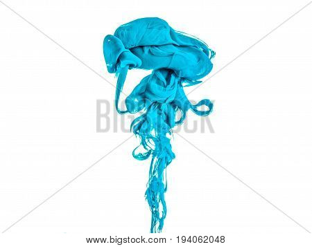 Ink swirl in a water, isolated on white background. The paint in the water. Soft dissemination a droplets of colored ink in water close-up. Explosion of color splashes acrylic ink.