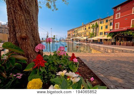 Lazise Colorful Harbor And Boats View