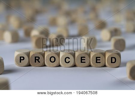 Proceed - Cube With Letters, Sign With Wooden Cubes