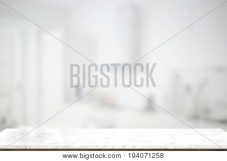 Empty marble top table for product display montage with blurred bath room interior Bckground.