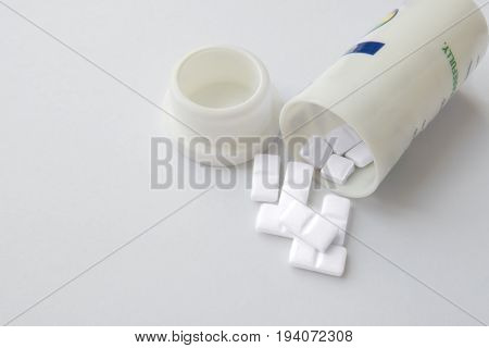 Pills spilling out of pill bottle. Top view with copy space. Medicine concept