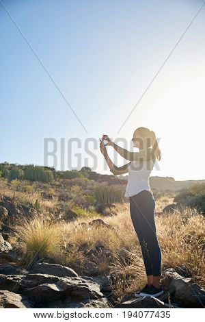 Lovely Young Woman Taking A Photo