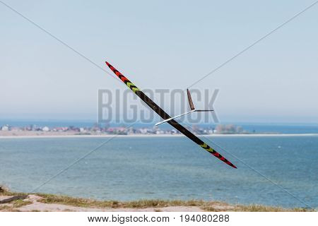 Rc Soaring Plane On Blue Sky
