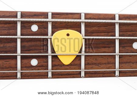 Metallic volume treble guitar bass knobs. Electric guitar. Red electric bass guitar close-up. Musical instrument. Music. Four strings. Grif.