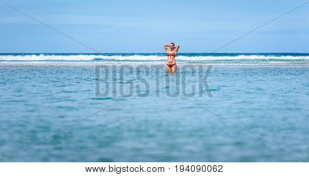 Woman Enjoying The Sea And Waves Of Atlantic Ocean.