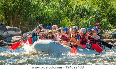 Village Myhiya Nikolaev region Ukraine - July 2 2017: Kids and rafting. A popular place for extreme family recreation and training of athletes in rafting and kayaking.