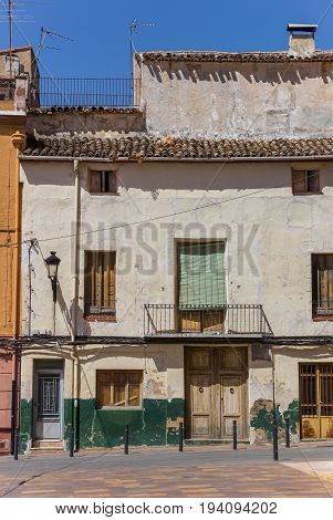 Old White House At A Small Square In Ayora