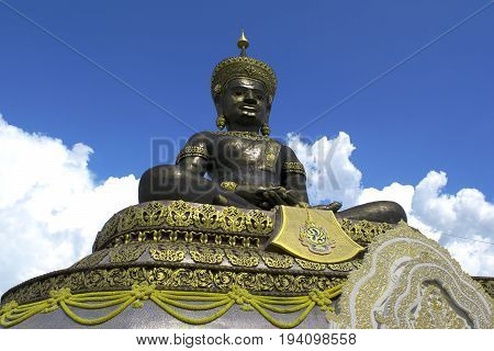 Phra Buddha Maha Dhammaraja Chaloem Phra Kiat statue at Pechabura Buddhist Park.Thailand
