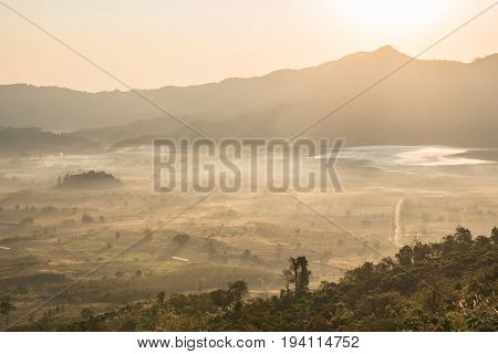 scenic mountain landscape and fog on the hill in Phu Lung ka forest park during the sunrise natural landmark located in Phayao province Thailand