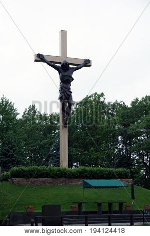 INDIAN RIVER, MICHIGAN / UNITED STATES - JUNE 18, 2017: The Cross in the Woods Roman Catholic National Shrine features the world's largest crucifix.