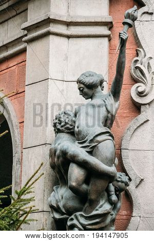 Riga, Latvia - December 13,2016: Riga Latvia. Old Statues On Facade Of Old Cinema Building In Elizabetes Street. Splendid Palace Is The Oldest Cinema In Riga.