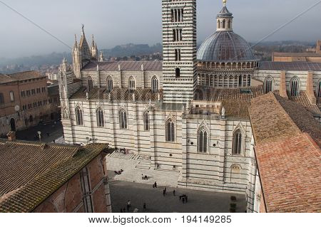 Italy Siena - December 26 2016: the view from facciatone of Duomo di Siena or Metropolitan Cathedral of Santa Maria Assunta on December 26 2016 in Siena Tuscany Italy.