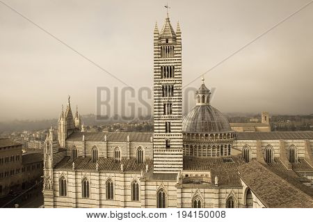 Italy Siena - December 26 2016: the view from facciatone of Duomo di Siena or Metropolitan Cathedral of Santa Maria Assunta on December 26 2016 in Siena Tuscany Italy.