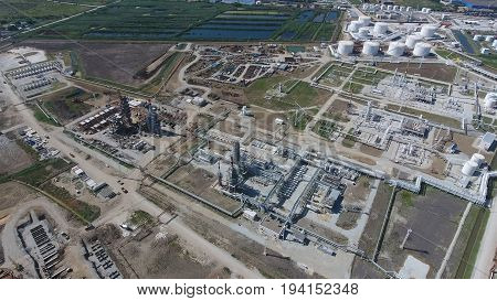 Oil Refinery Plant For Primary And Deep Oil Refining. Equipment And Tanks In The Oil Refinery. Recti