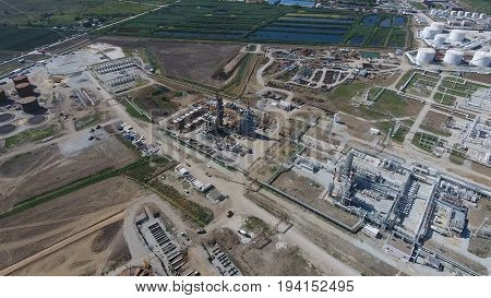 Oil Refinery Plant For Primary And Deep Oil Refining. Equipment And Tanks In The Oil Refinery. Recti
